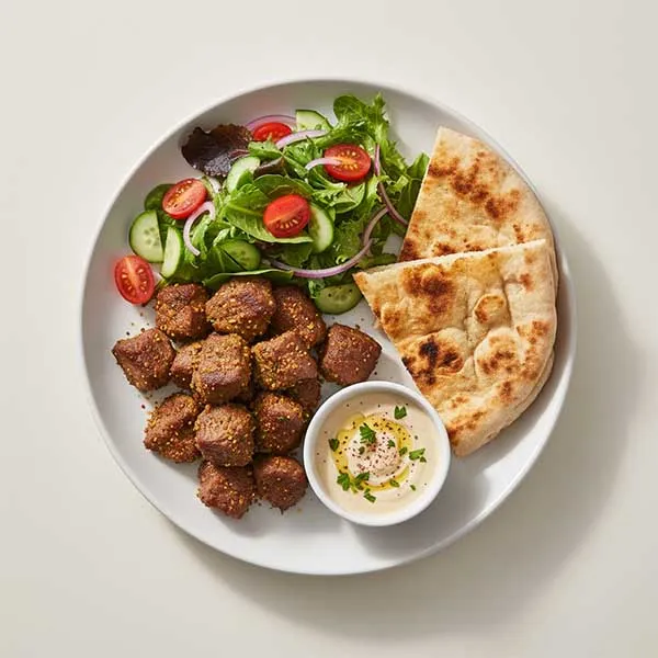 Ras El Hanout Spiced Beef With Wheat Pita, Fresh Salad And Tahini Sauce